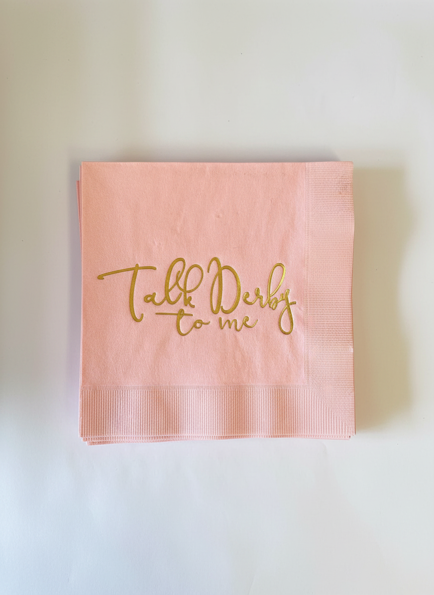 Overhead flat lay of pink napkins