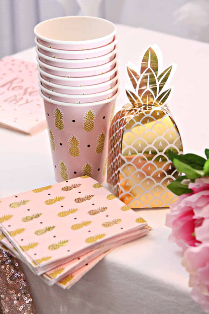 Gold pineapple cocktail napkins and cups with our gold foil pineapple favor boxes for tropical themed events