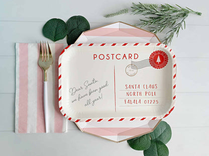 Vintage santa postcard paper plate layered with our Blush Pink Cabana striped paper plates for your Kids Christmas Party Supplies