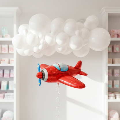 Red Airplane Balloon with Cloud Garland in Bright Shop