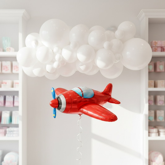 Red Airplane Balloon with Cloud Garland in Bright Shop