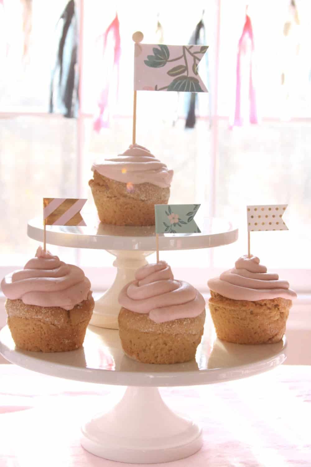 Cake stand full of cupcake for a shabby chic baby shower