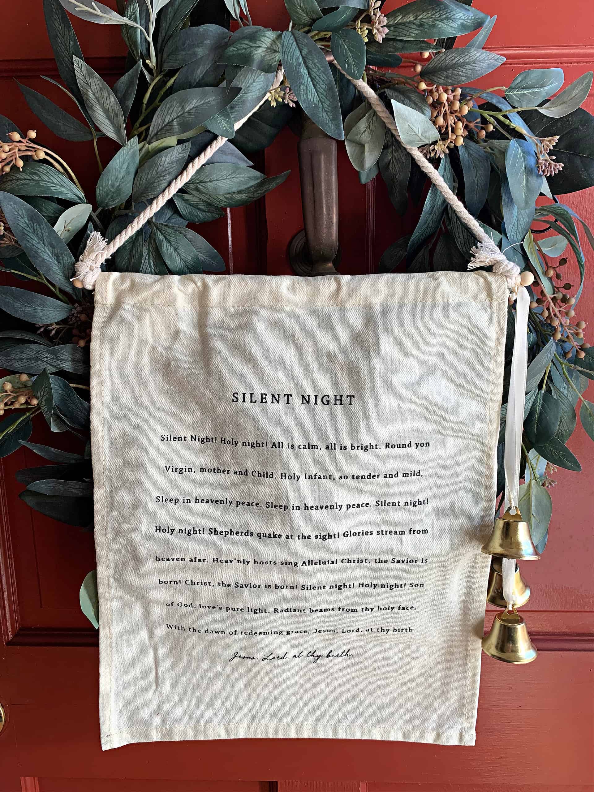 Deck the halls with the timeless charm of a cherished Christmas carol using our Silent Night Canvas Banner with Bells, featuring the enchanting lyrics of the classic tune.