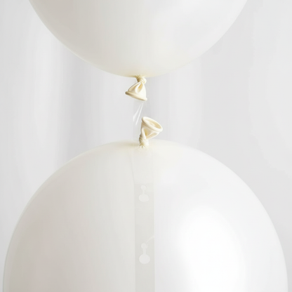 White Balloons on Garland Tape