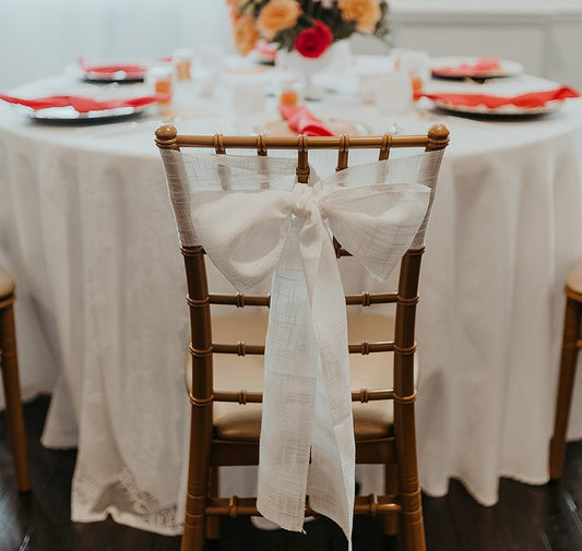 Chair sashes are the perfect way to elevate the look of your event, adding an elegant finishing touch to your venue's seating. Whether you're hosting a wedding, bridal shower, baby shower, birthday party, or formal dinner, chair sashes bring a polished, cohesive look to your decor.