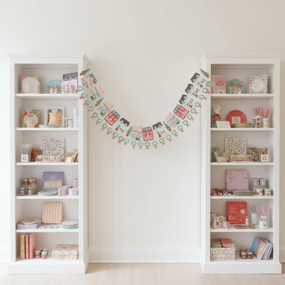 Winter village houses banner between bookcases - wide shot